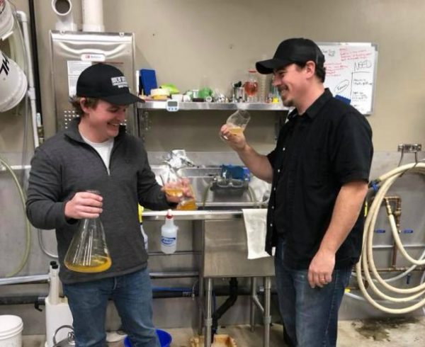 Solid Ground Brewing's KC Sare and Scott Johnson in the brewing lab