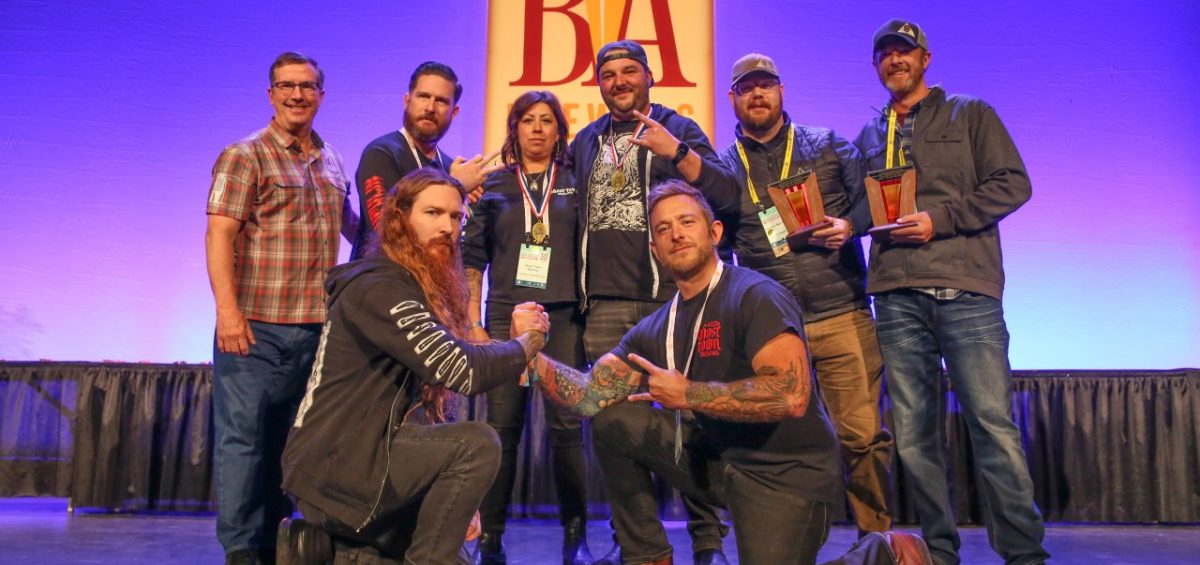 Ghost Town Brewing Receiving 2022 GABF Brewery of the Year Award on stage in Denver, CA.